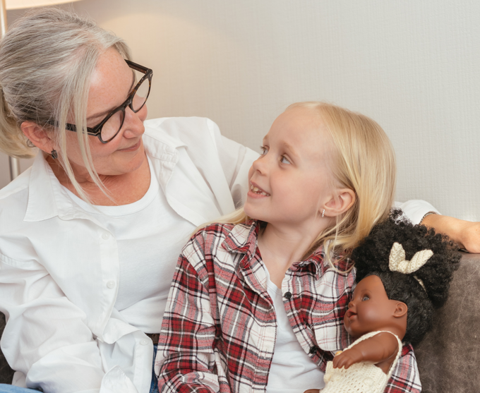 Adult Woman with Girl and Doll